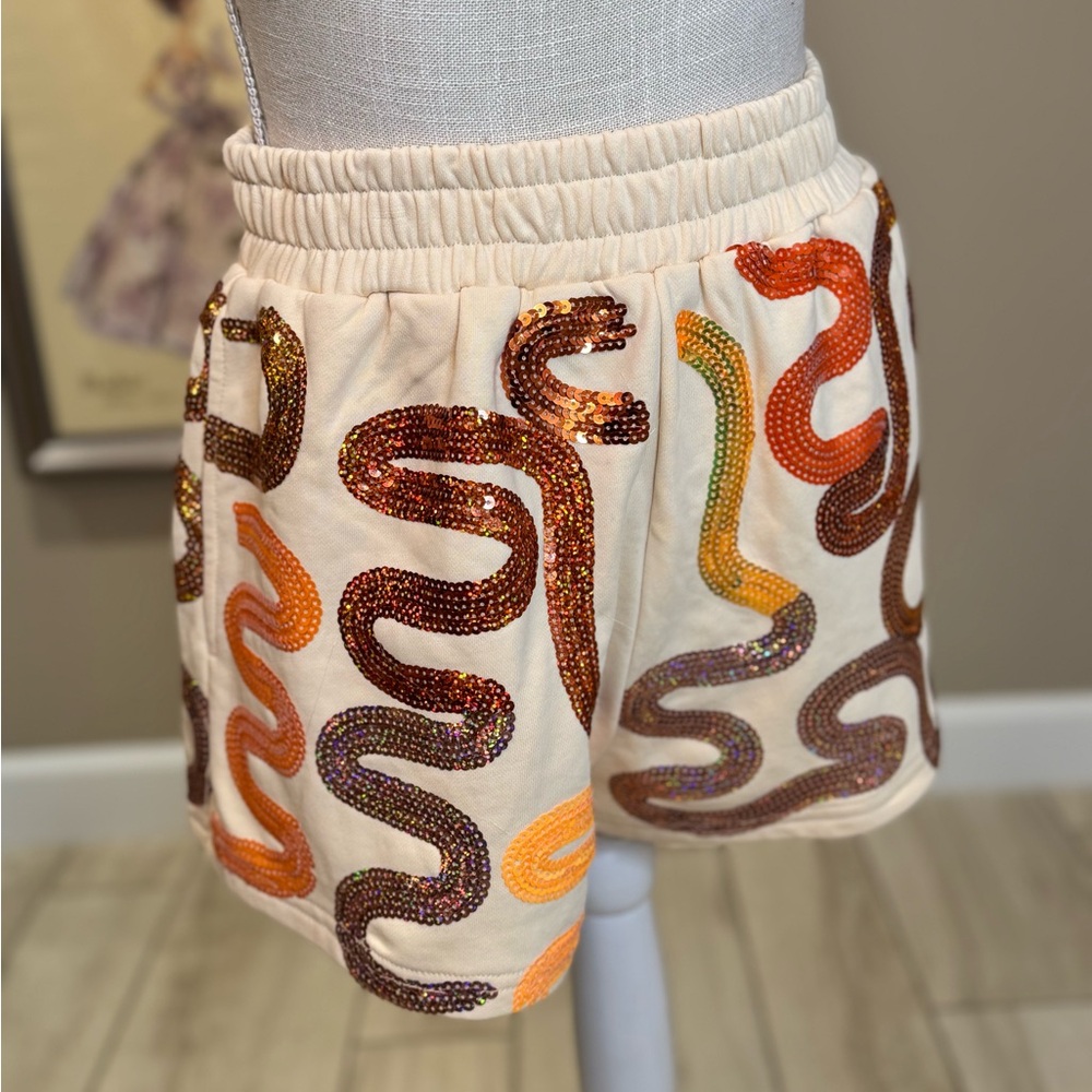 New! QUEEN OF SPARKLES Orange Sequin Squiggle Cream Shorts